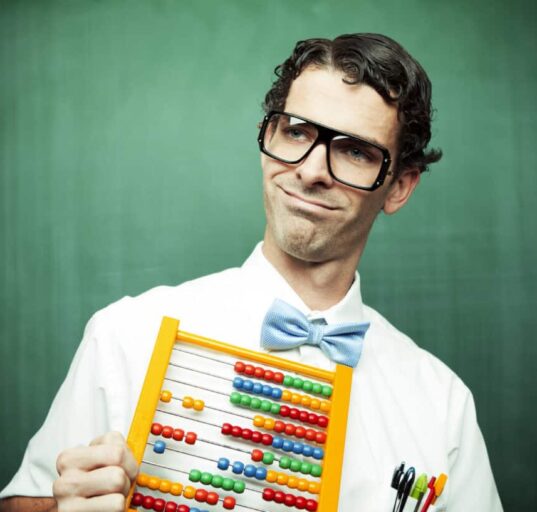 man in bowtie poses with abacus
