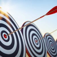 arrows hit bullseye on target