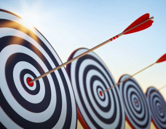arrows hit bullseye on target
