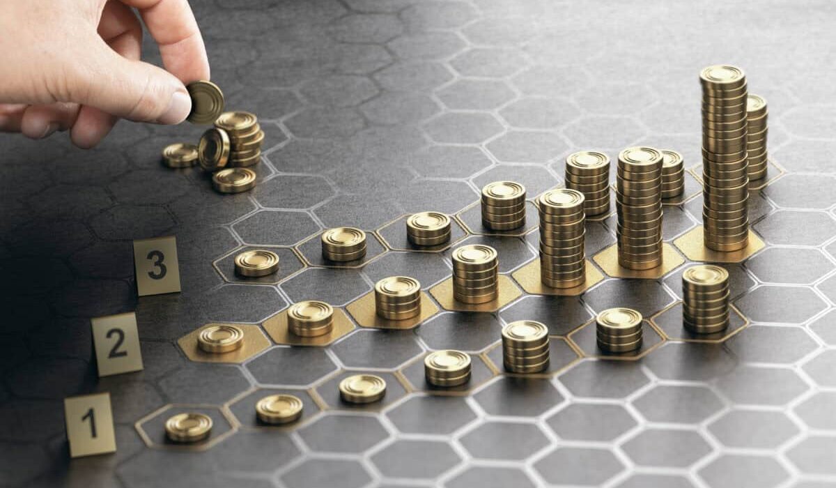 hand stacks coins