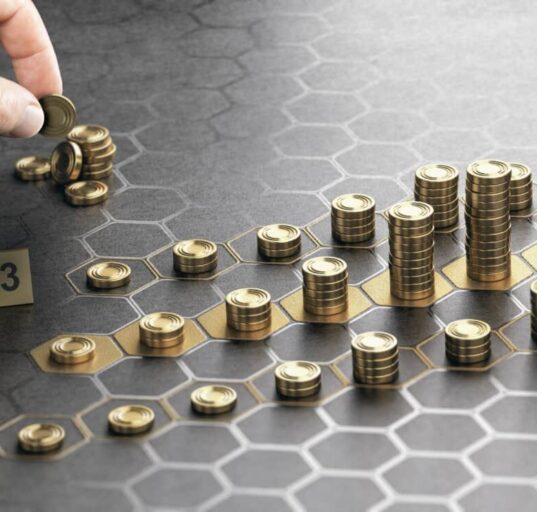 hand stacks coins