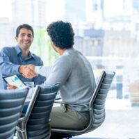 businessmen shake hands to close a deal