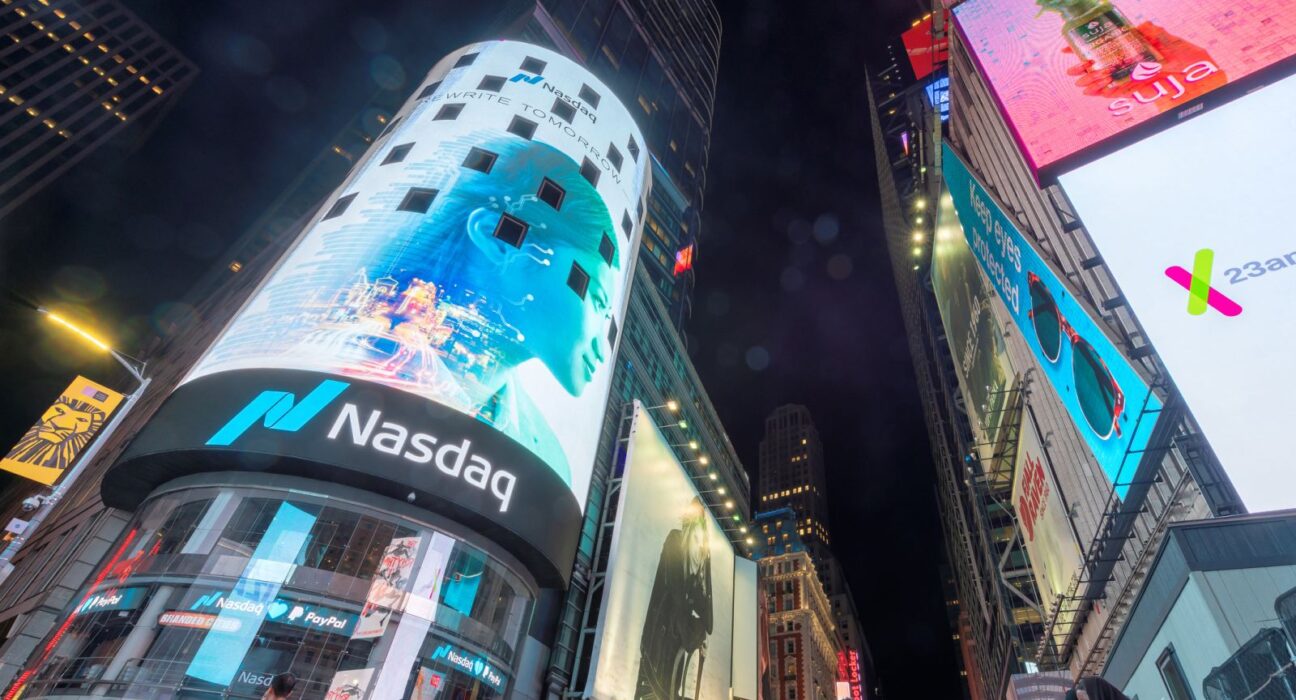 Stocks Settle Sharply Higher as Crude Prices Plunge and Chipmakers Soar