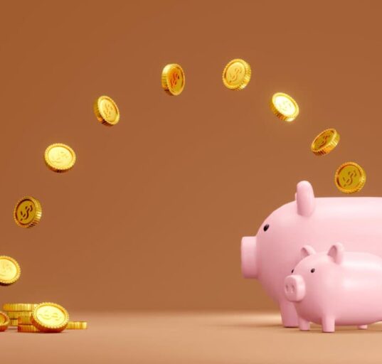 coins jump into piggy bank