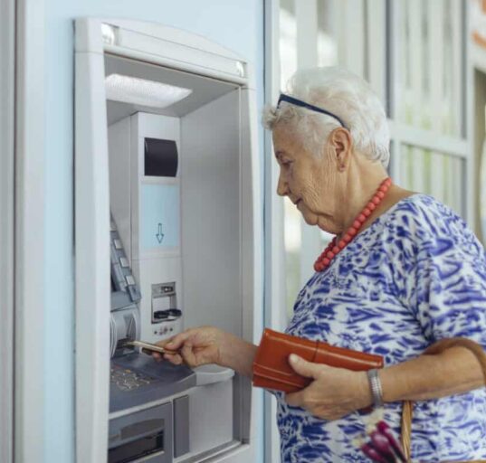 customer uses bank ATM